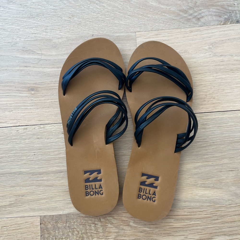 Never worn billabong black and tan sandals